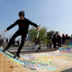 The skate ramp covered in Extinction Rebellion logos on Waterloo Bridge.